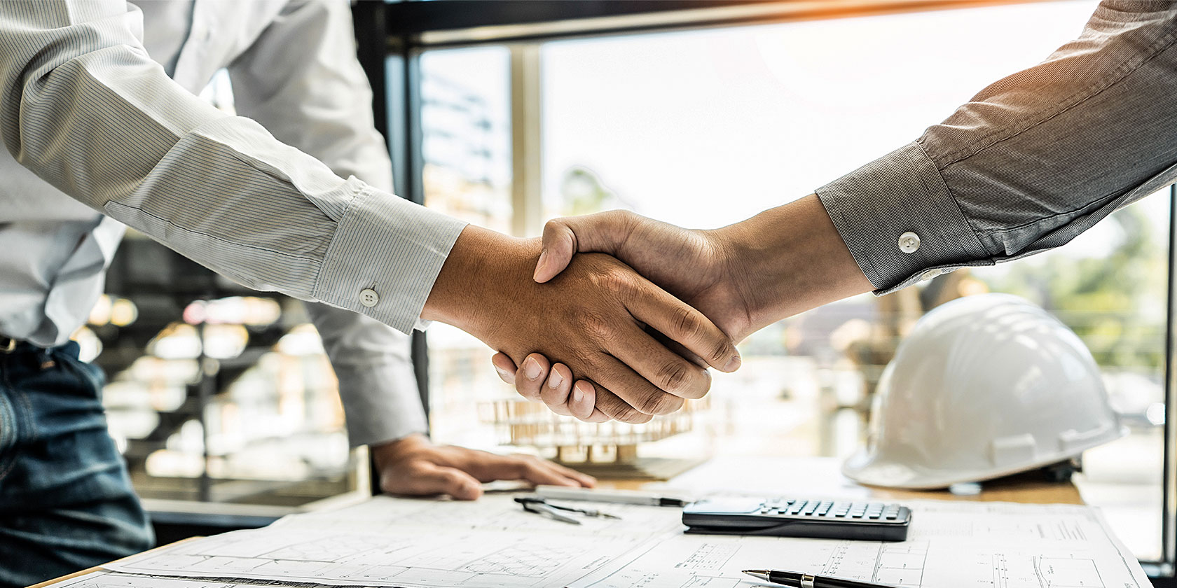 Two people shaking hands